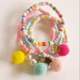 AQUA BLUE WITH POM POM AND PEARL Bracelet