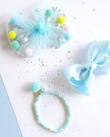 AQUA BLUE WITH POM POM AND PEARL Bracelet