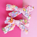 FLORAL SEQUIN BOW CLIP