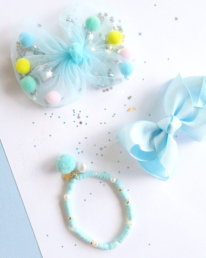 AQUA BLUE WITH POM POM AND PEARL Bracelet