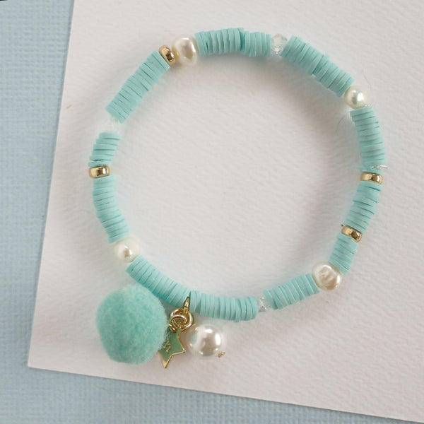 AQUA BLUE WITH POM POM AND PEARL Bracelet