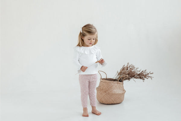 SNOW RIB RUFFLE TOP