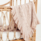 BLUSH RUFFLE CABLE KNIT BLANKET